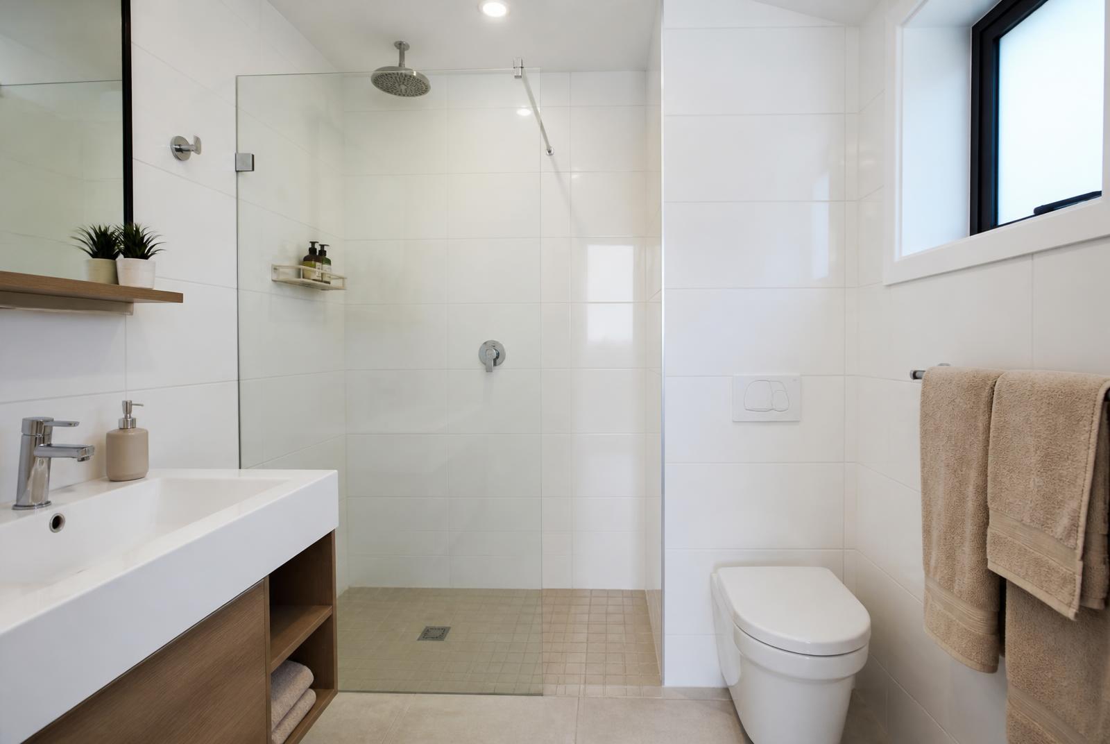Clean en-suite bathroom with shower at Epicure Home Guesthouse